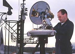 Working on a satellite communication system on an oil support ship